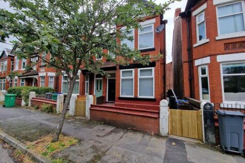 Charming red brick home on a quiet street...