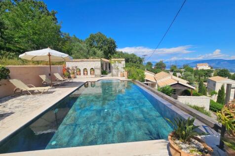 Pool terrace and house below