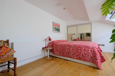 Mezzanine bedroom with large wardrobe