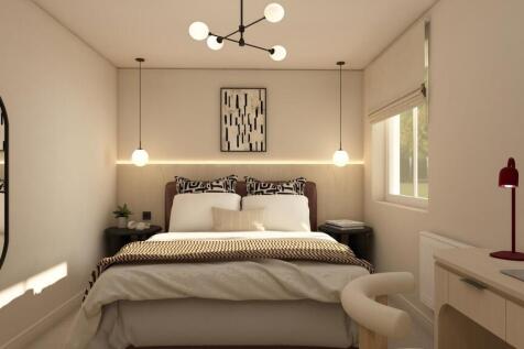 Stylish master bedroom with modern study area...