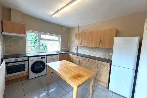 Bright, well-equipped kitchen with plenty of co...