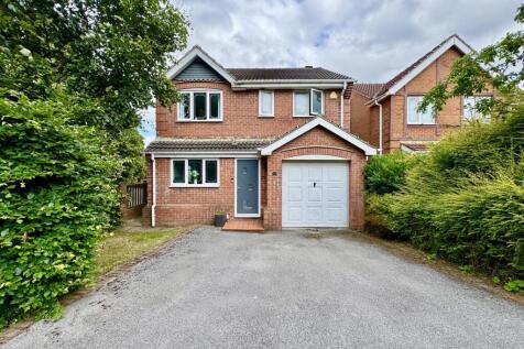 EXTERNAL FRONT AND DRIVEWAY