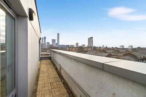 Enjoy sweeping views of the city skyline from your private terrace.