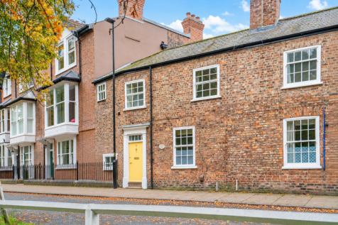 Quiet Autumn Terraced Street with Yellow Door.png