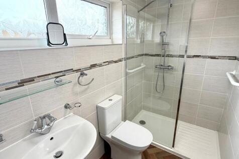 RE-FITTED TILED 3-PIECE SHOWER ROOM