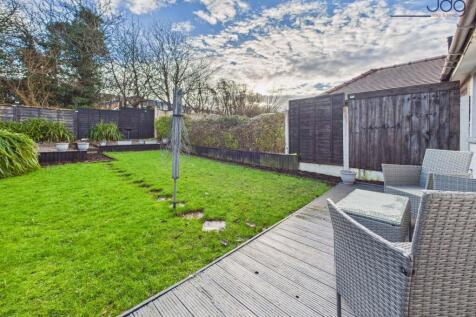 Spacious East Facing Garden with garage and shed