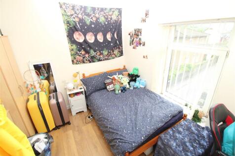 Bright double bedroom with ample natural light...