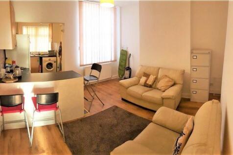 Bright, modern open-plan living area with comfo...