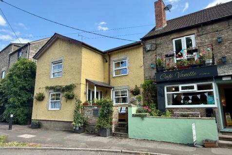 Wobage Cottage is the yellow house.