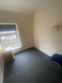 Bright workspace with natural light and storage...