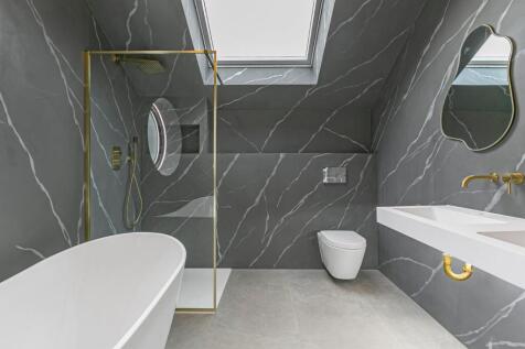 property in Grand Drive, 
Raynes Park, SW20