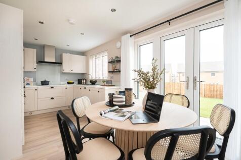 The dining area overlooks the rear garden