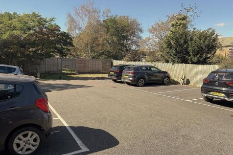 COMMUNAL GROUNDS, GARAGES &amp; PARKING