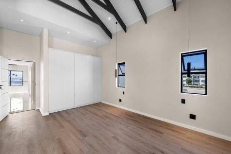 Main ensuite bedroom with built in cupboards