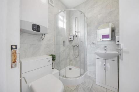 Fully tiled  bathroom