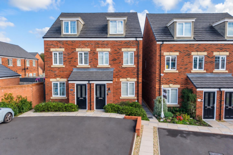 Modern Red-Brick Homes on a Sunny Estate (1).png