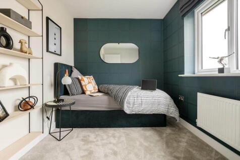 The third bedroom offers space for a growing family