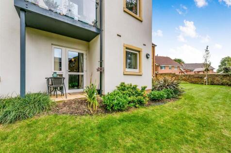 Door from living room to patio and gardens.jpg