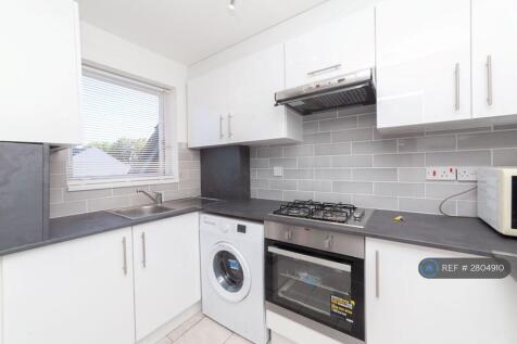 Kitchen With Oven And Washing Machine