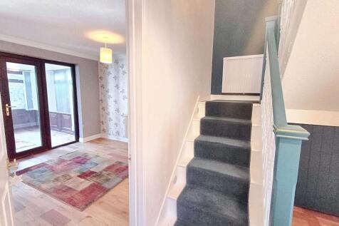 Hall, stairs into Living room