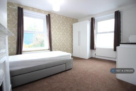Bedroom With Private Bathroom And Kitchenette