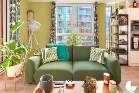 Modern Green Living Room with City Views