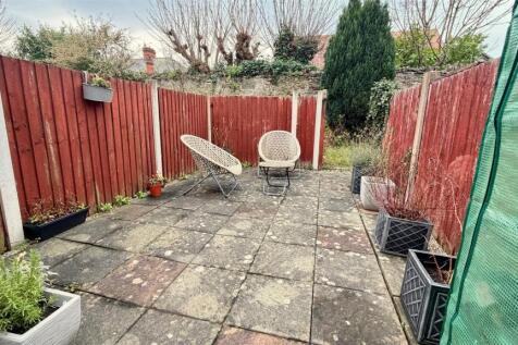 PAVED REAR COURTYARD