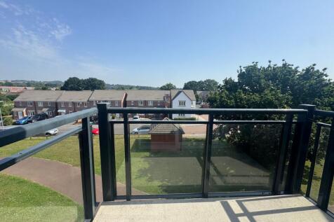Balcony to open plan kitchen / living area.