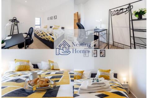 Bright and inviting double bedroom featuring a ...