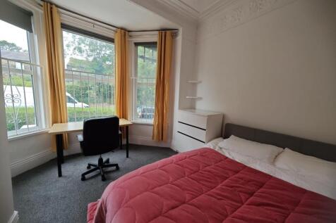 Bright and inviting master bedroom featuring a ...
