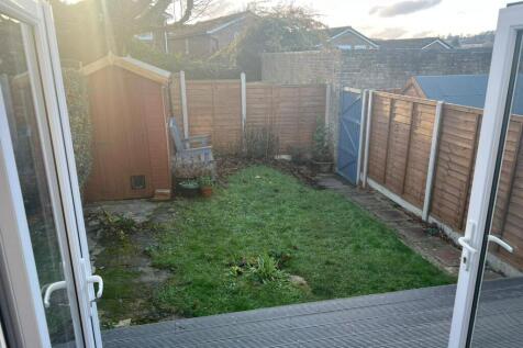 Private garden with lawn and sunny decking area...