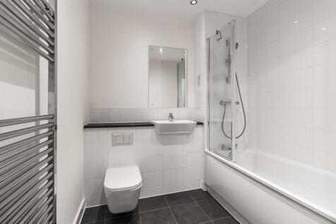 Step into elegance with this sleek bathroom design, where style meets functionality.