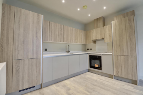 Modern Light Oak L-Shaped Kitchen.png