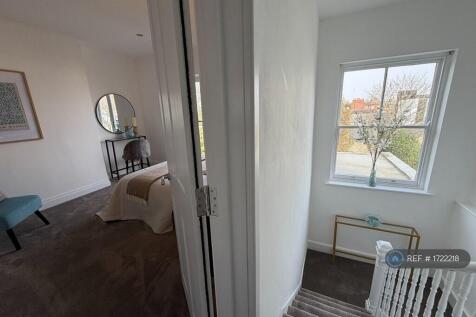 Photo Of Hallway And Bed 1