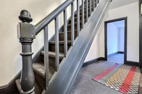 Bright hallway with stylish character features...