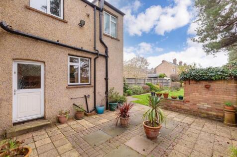 Rear Patio to the side of the kitchen
