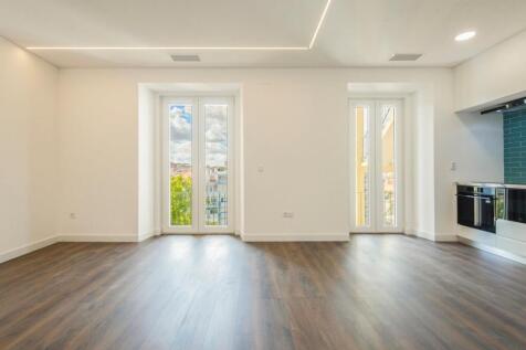 Fully Renovated Three-Suite Apartment with Balcony