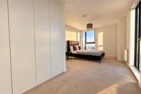 Sunlit Modern Bed...