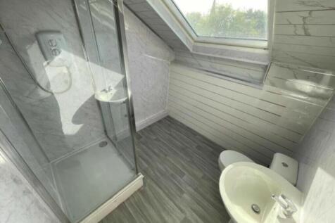 A clean and well-maintained bathroom featuring ...