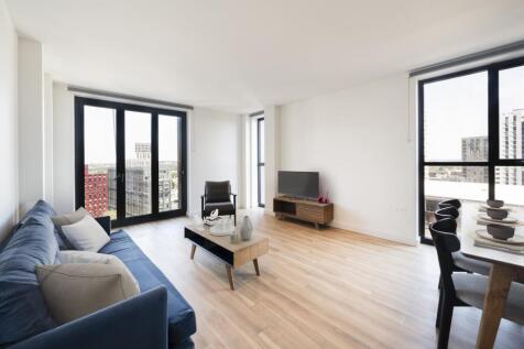 Experience elevated city living with this stylish and bright living room space.