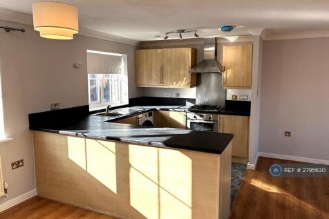 Modern Fitted Kitchen With Breakfast Bar