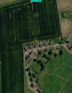 Aerial view. House marked by arrow.