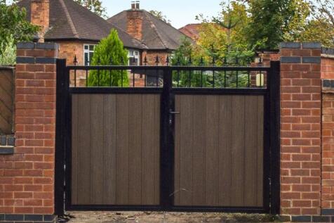 Gated Side Driveway with Garage