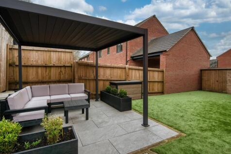 Garden - dining patio and astroturf lawn.jpg