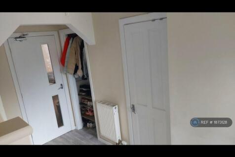 Hallway With Two Storage Cupboards 
