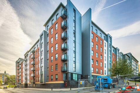 Modern multi-storey residential building with r...