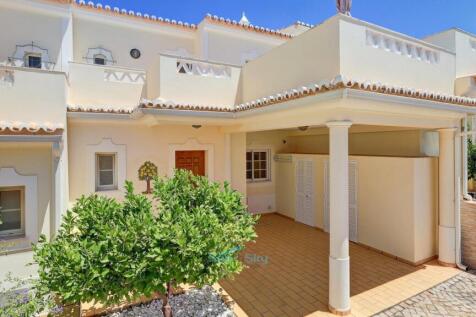 mid-row home with carport
