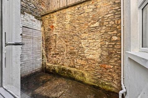 Private enclosed stone courtyard space...