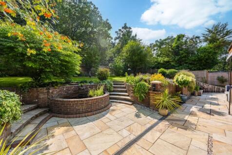 Landscaping includes tranquil water feature