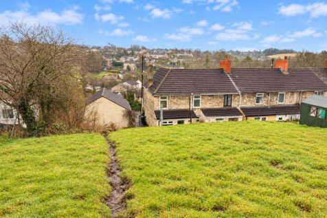Sunny Hillside View Over Stone Terraces.png